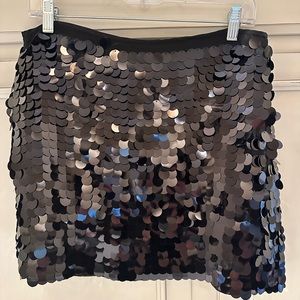 Black sequin mini skirt by Shinestar. Size Large.